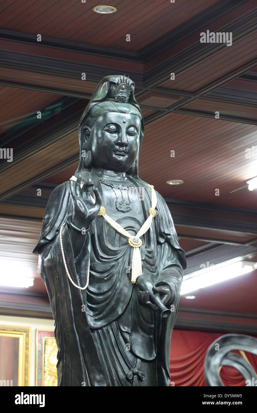 Black deity statues of Chinese religion in temple Stock Photo Alamy