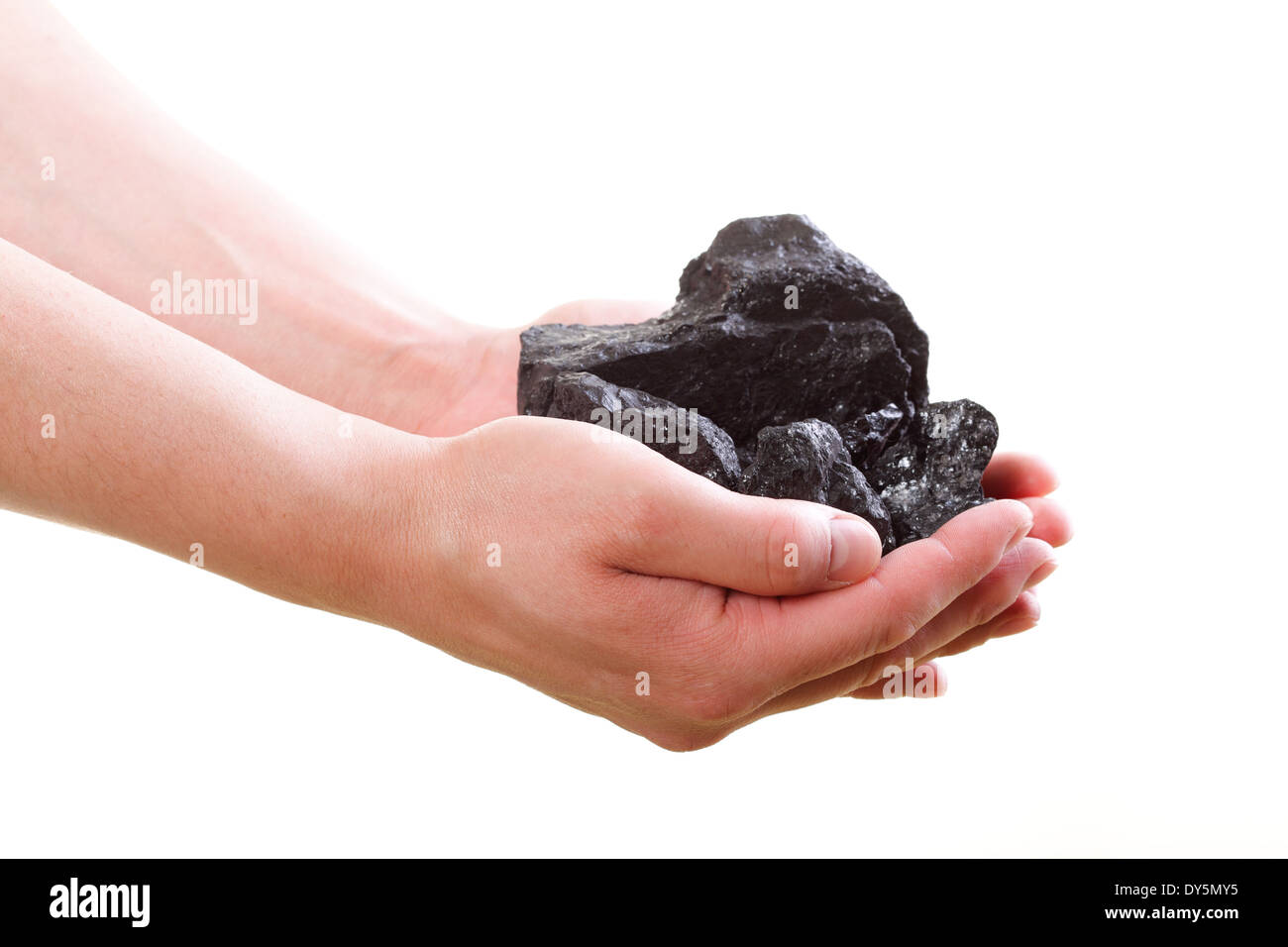 male hand holding coal on white background Stock Photo - Alamy
