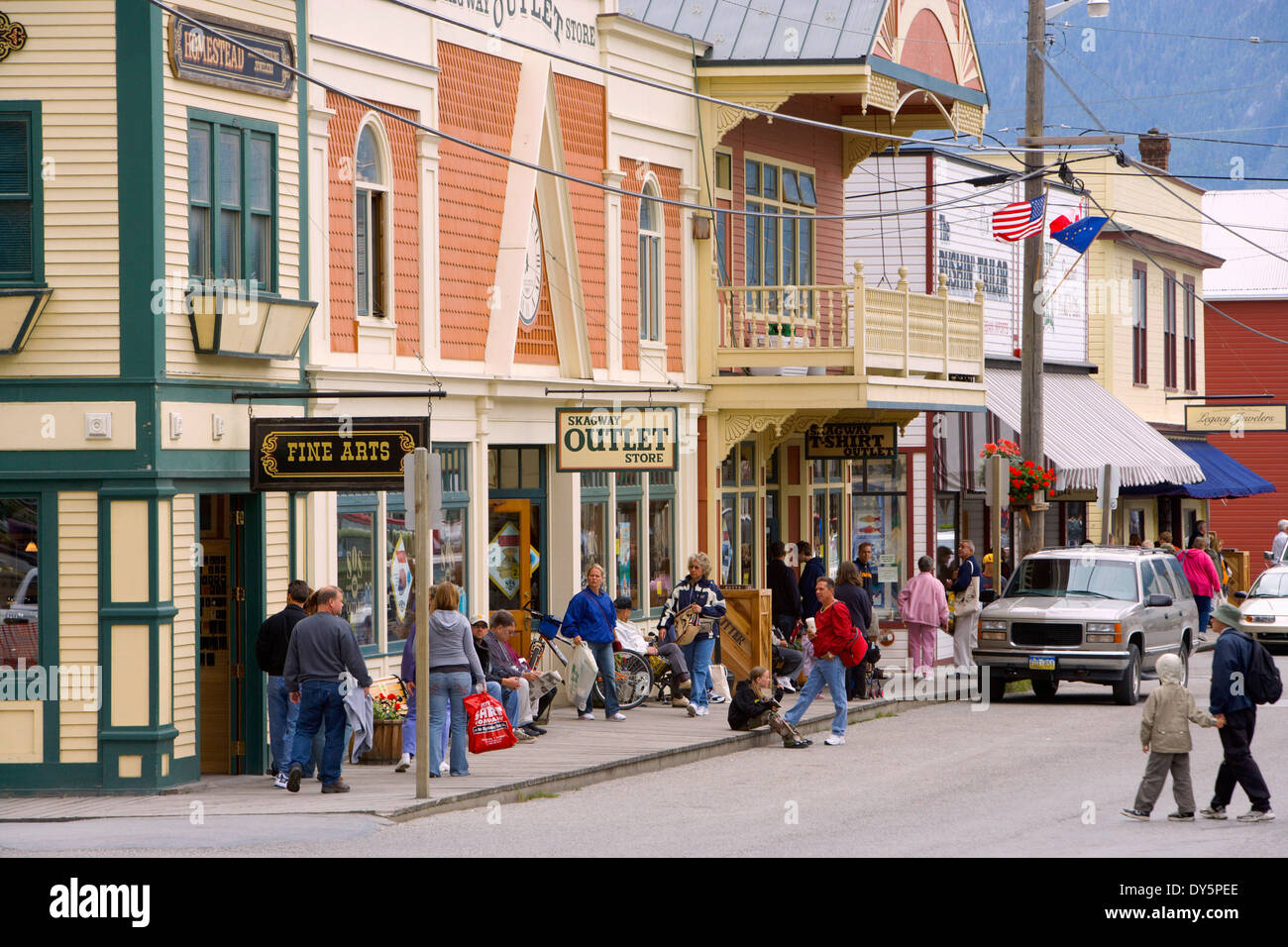 Tourists In Downtown Street Scene In Skagway, Alaska. Southeast, Summer