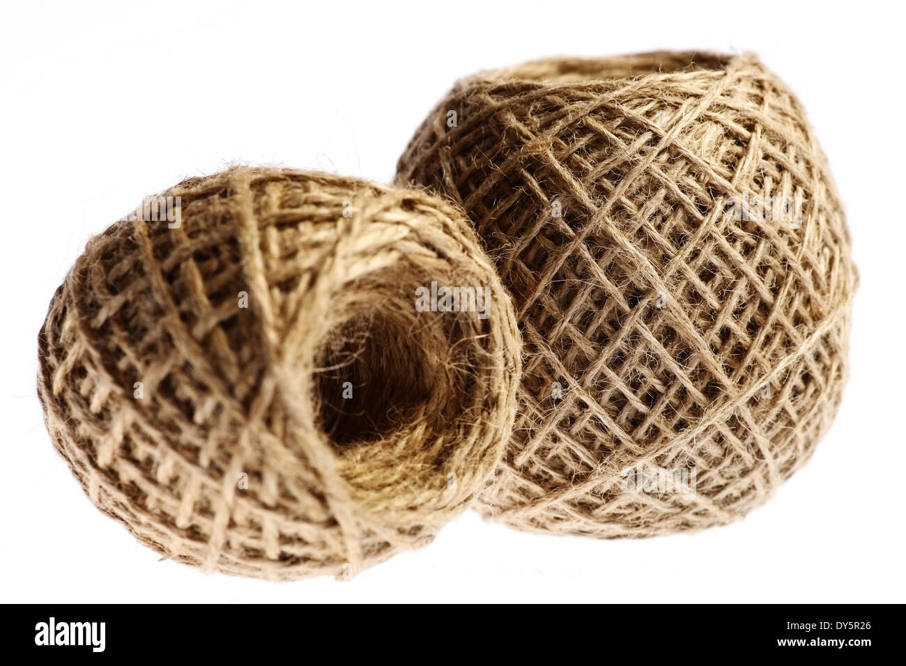 Ball of Strong Brown String Over White Background Stock Photo