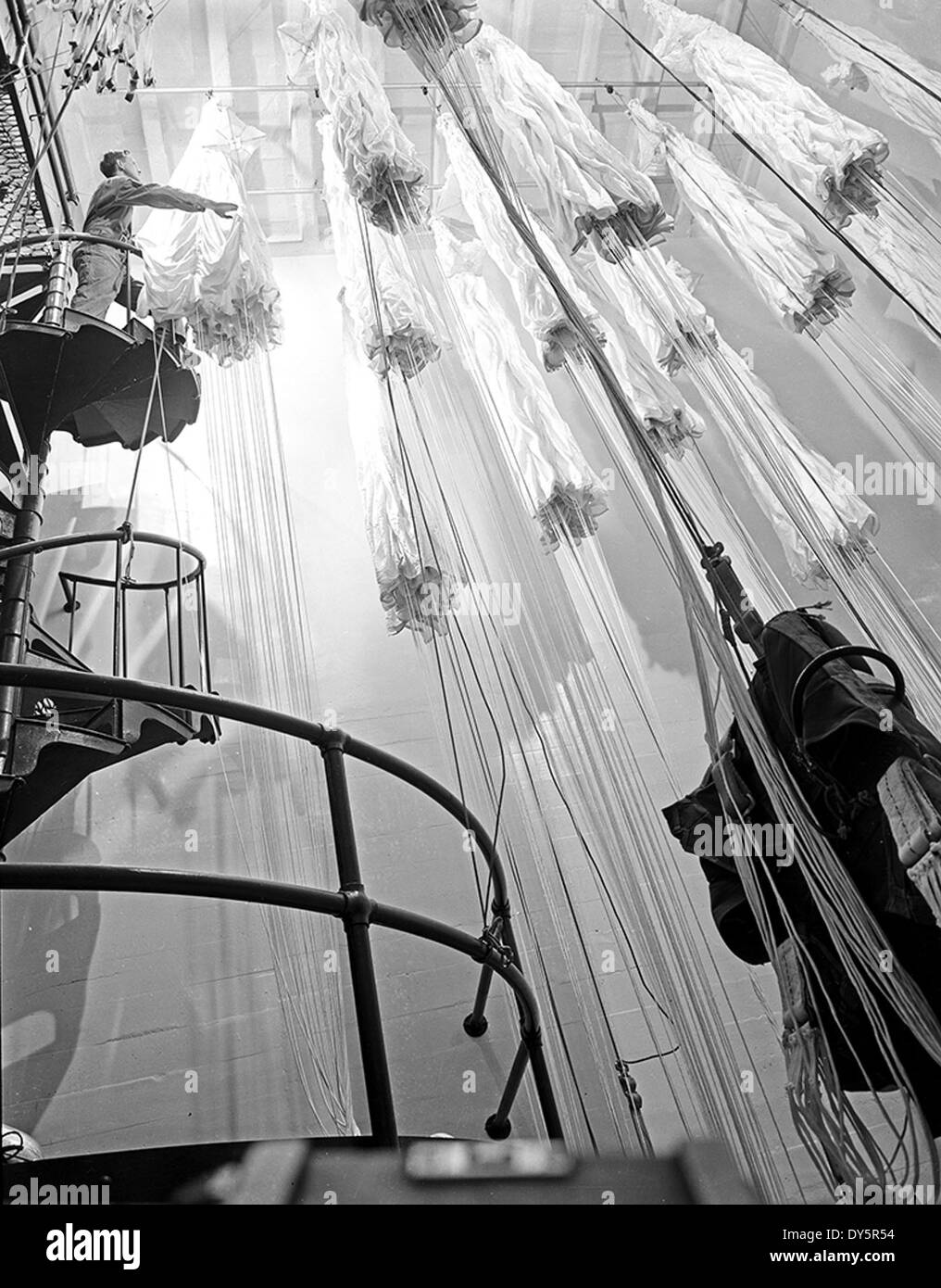 [Worker Hanging Parachutes, Pepperell Manufacturing Company] Stock Photo