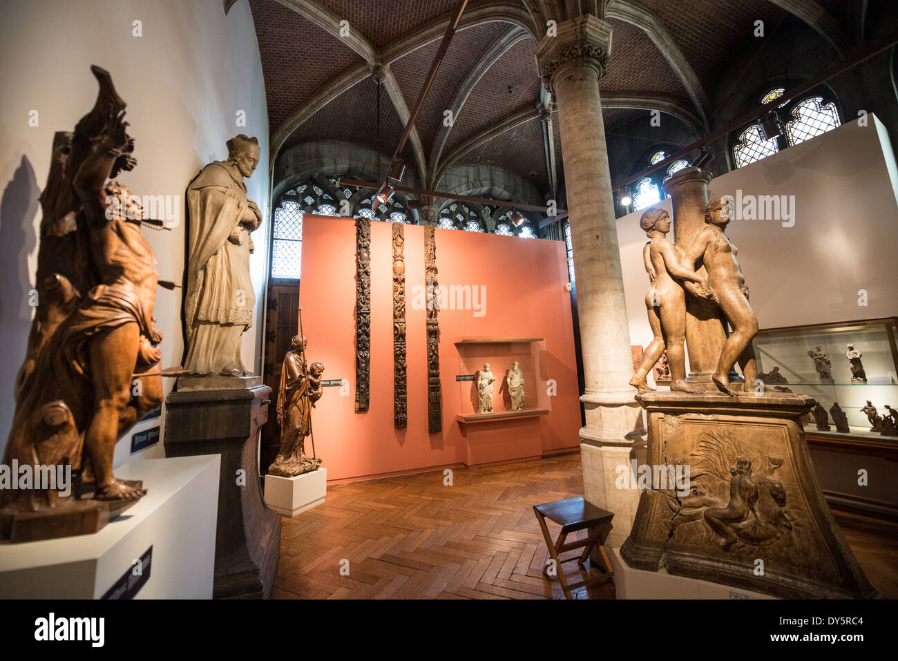 Historic statues on display at the Museum of the City of Brussels. The museum is dedicated to the history and folklore of the town of Brussels, its development from its beginnings to today, which it presents through paintings, sculptures, tapistries, engravings, photos and models. Stock Photo