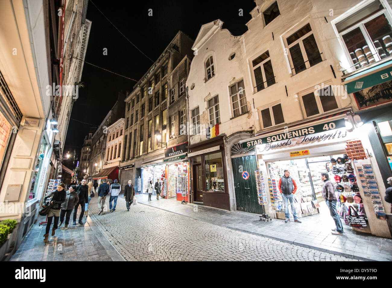 A cobblestone street in downtown Brussels at night. Stock Photo