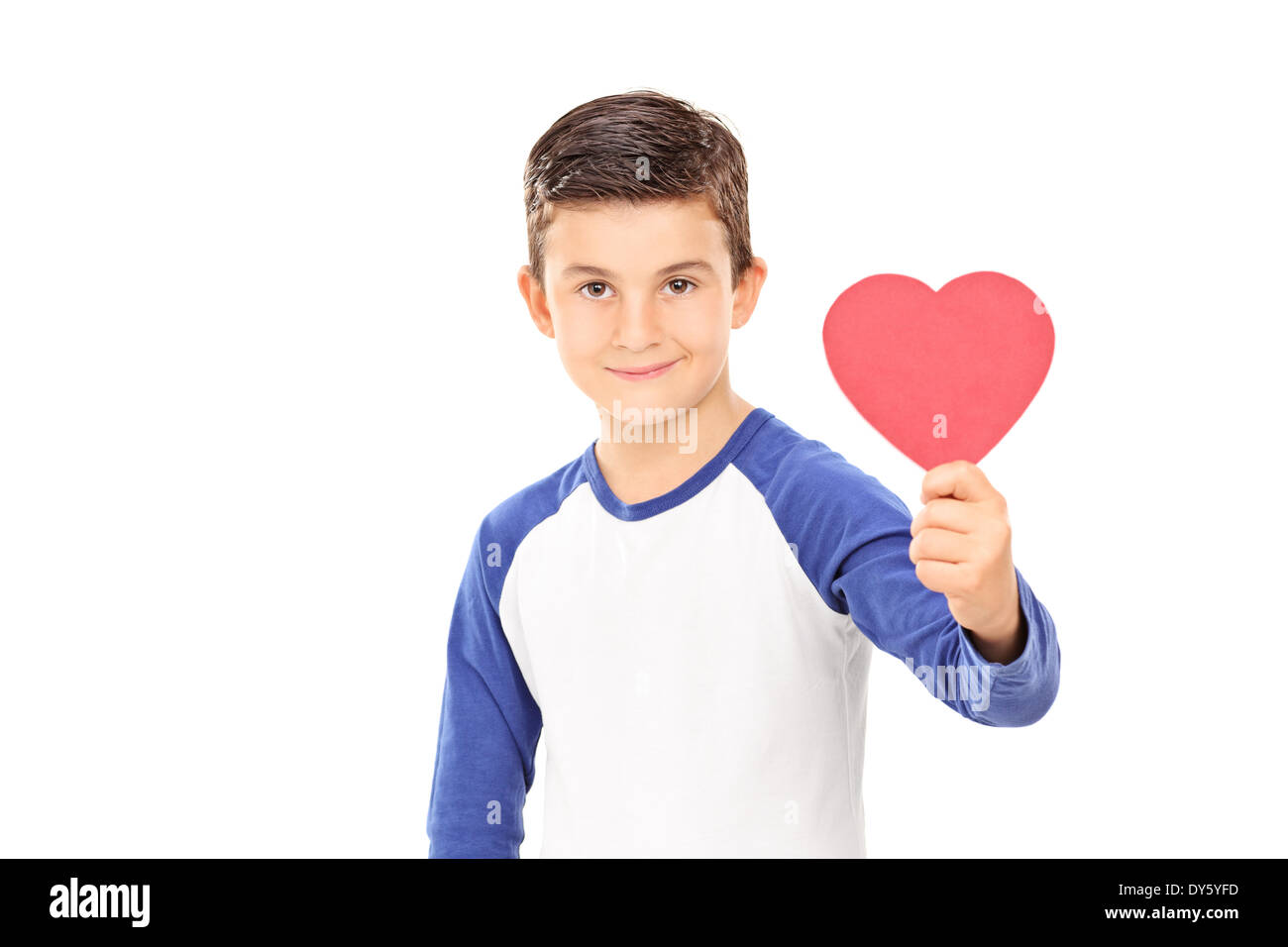 Young boy holding a red heart Stock Photo - Alamy