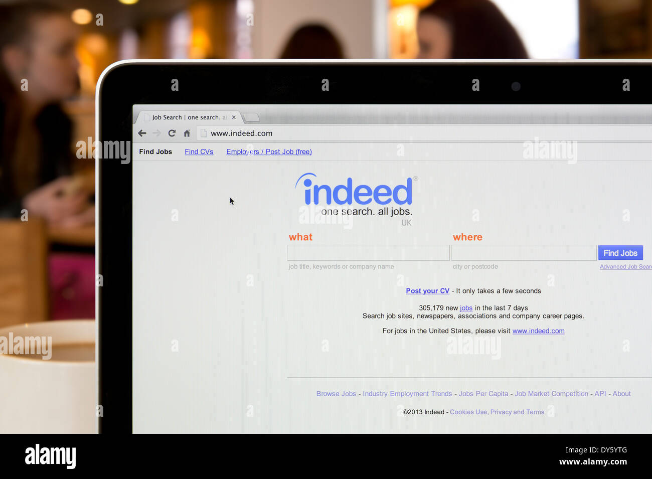 The Indeed website shot in a coffee shop environment (Editorial use only: print, TV, e-book and editorial website). Stock Photo