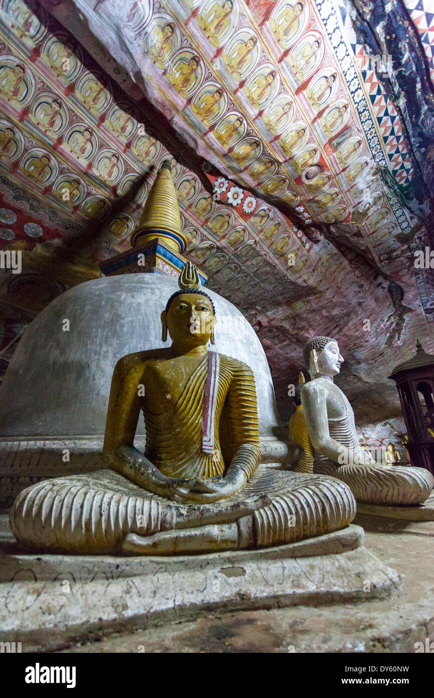 Two seated Buddha statues, Royal Rock Temple, Golden Temple of Dambulla