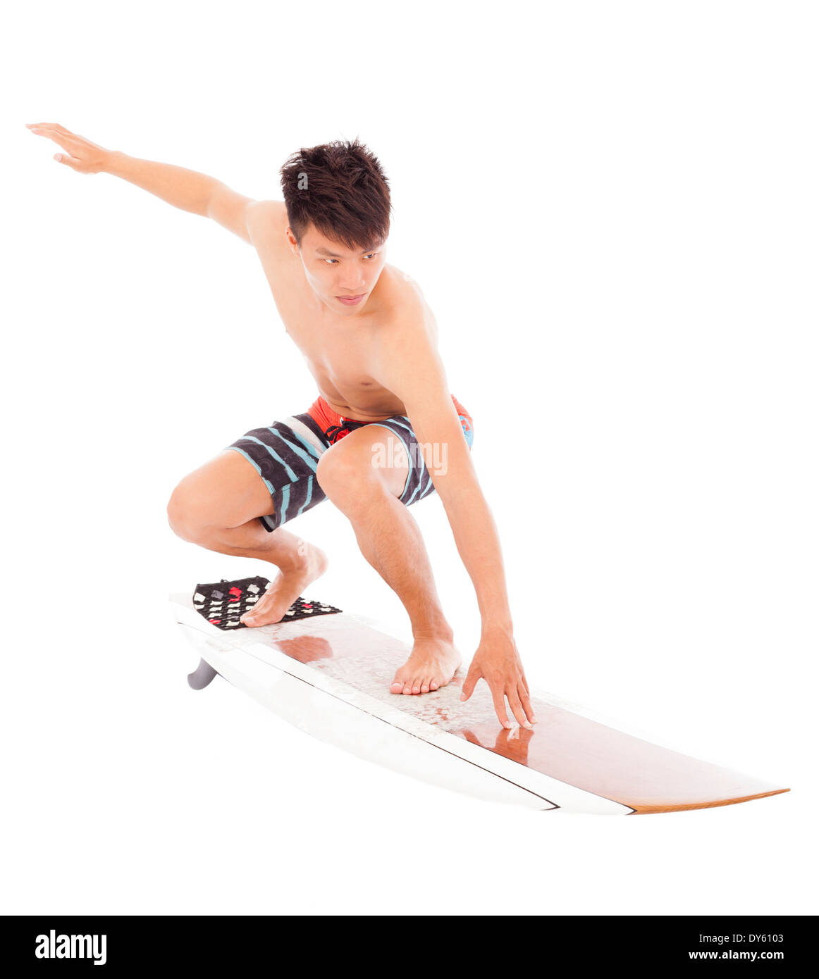 young surfer practice surfing pose Stock Photo