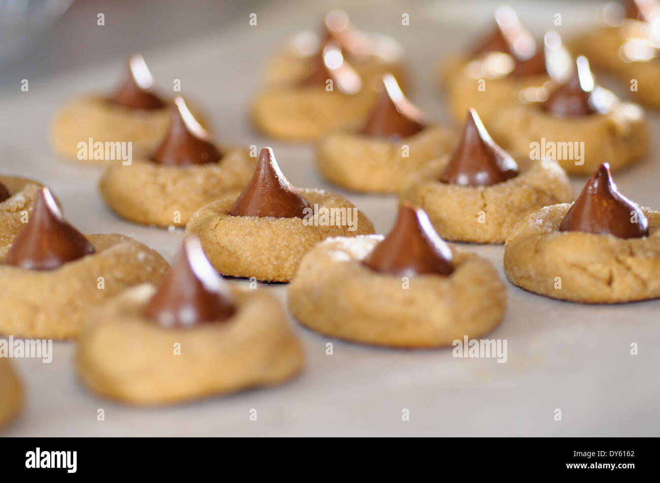 Chocolate kiss topped peanut butter cookie Stock Photo Alamy