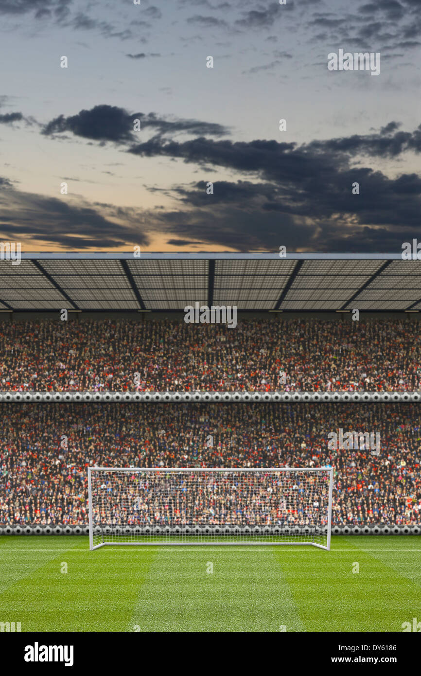 computer generated football stadium stand with crowd, goal posts and football pitch Stock Photo