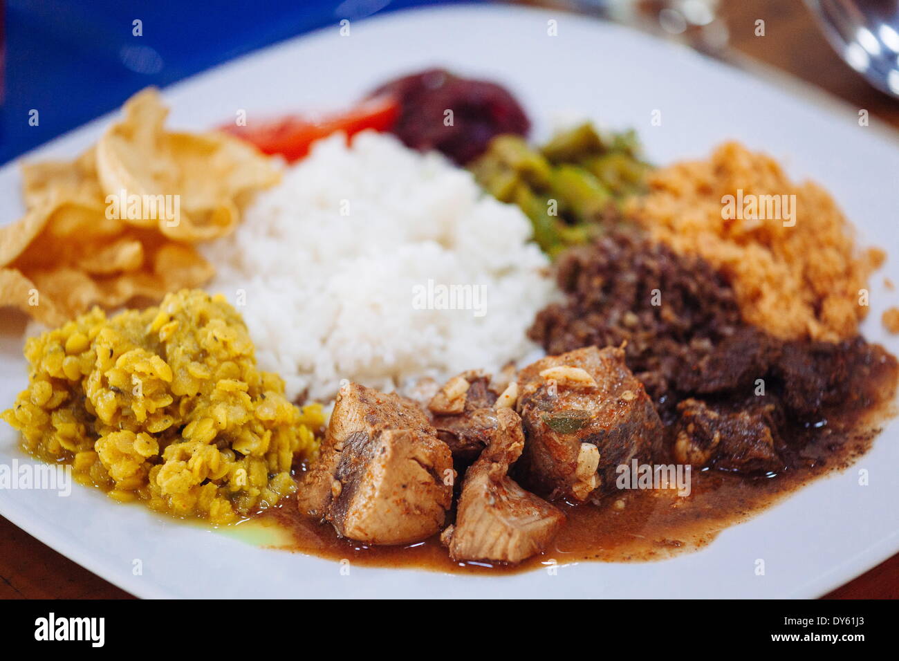 Traditional Sri Lankan cuisine including pol sambol, rotti and fish curry, Sri Lanka, Asia Stock Photo