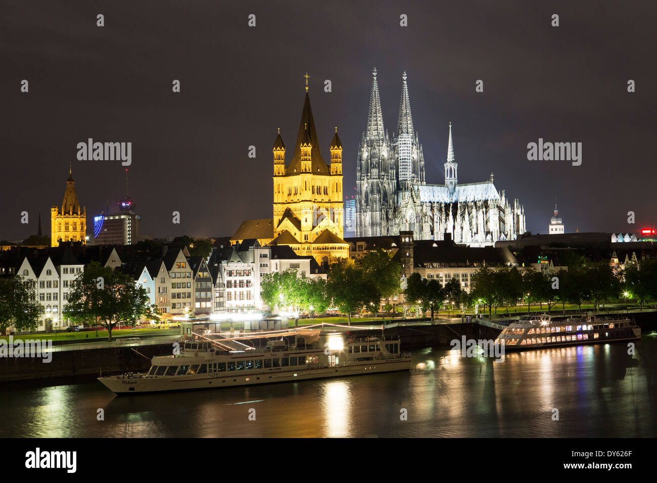View over river Rhine to old town, Heumarkt with cathedral and Great St. Martin church, Cologne, North Rhine-Westphalia, Germany Stock Photo