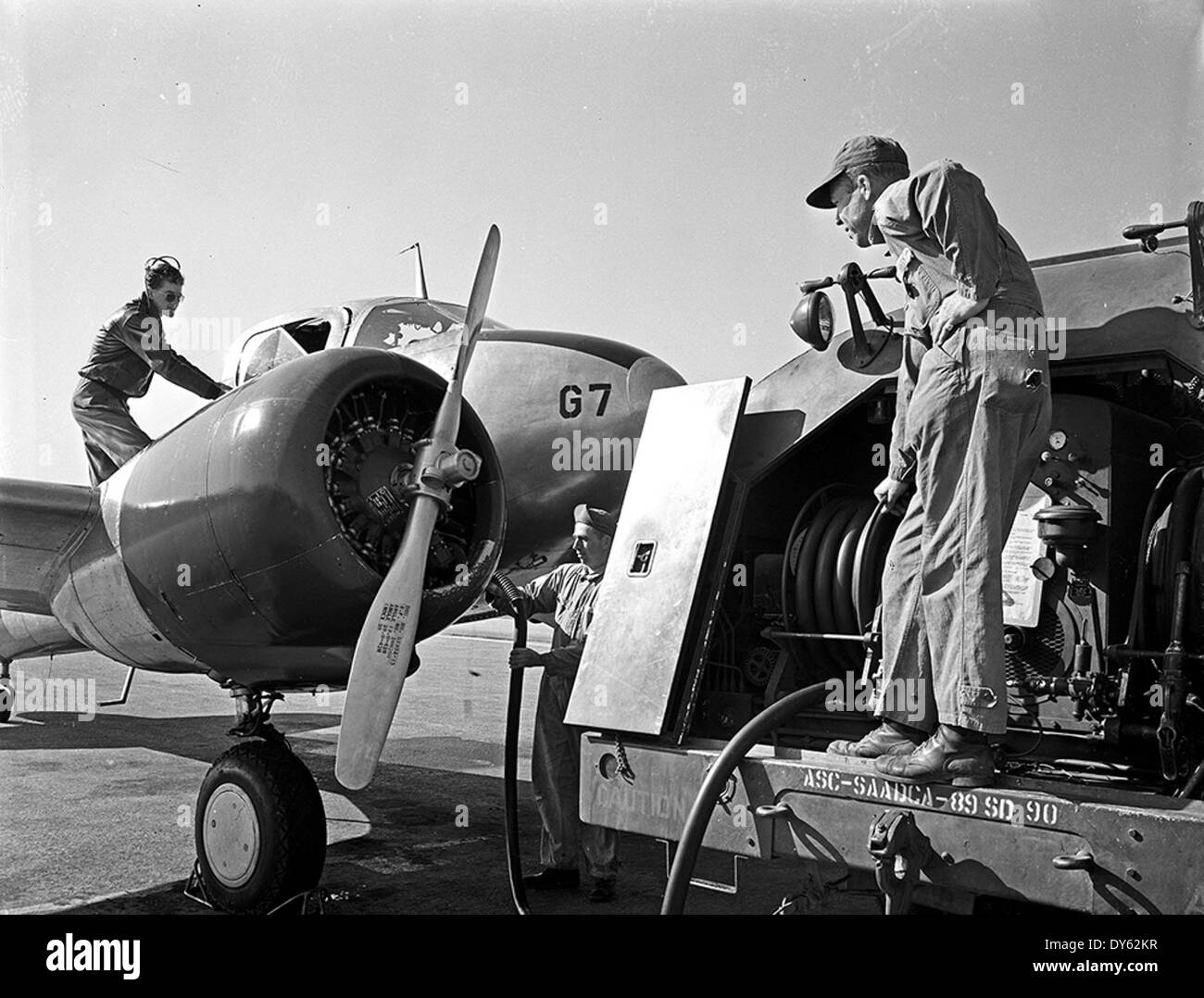 [Refueling Aircraft with Neoprene Hose, E. I. du Pont de Nemours and Company] Stock Photo