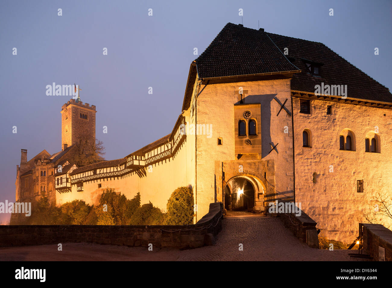 Wartburg Castle. It was during his exile at Wartburg Castle that Martin Luther translated the New Testament into German. In 1999 Stock Photo