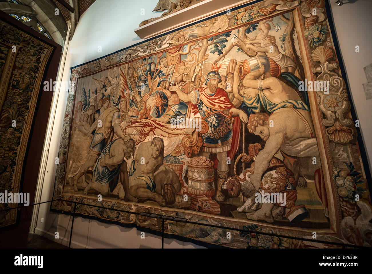 A 17th century baroque tapestry on display at the Museum of the City of Brussels. The museum is dedicated to the history and folklore of the town of Brussels, its development from its beginnings to today, which it presents through paintings, sculptures, tapistries, engravings, photos and models. Stock Photo
