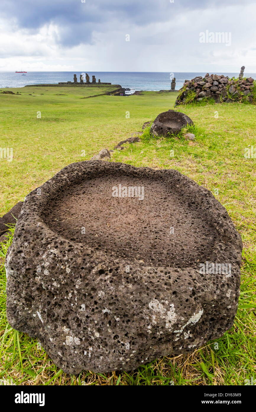 House foundation and sevem moai in the Tahai Archaeological Zone on Easter Island (Rapa Nui), UNESCO Site, Chile Stock Photo