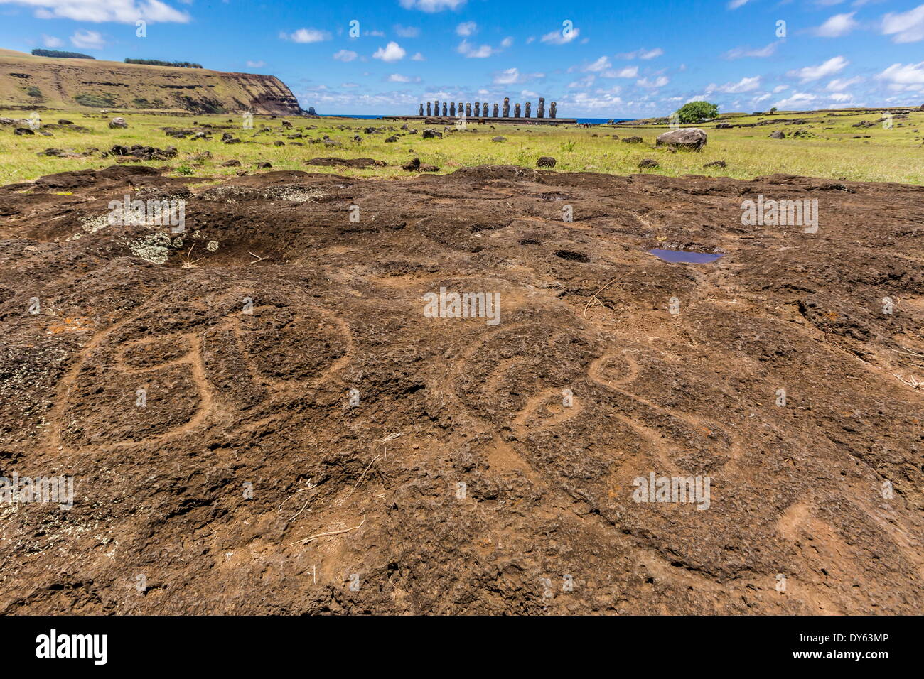 Petroglyphs carved in the lava at the restored ceremonial site of Ahu Tongariki on Easter Island (Rapa Nui), UNESCO Site, Chile Stock Photo