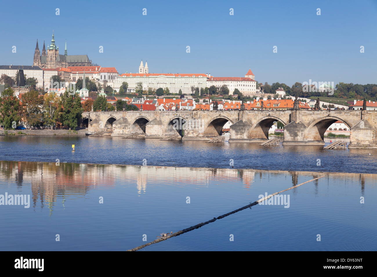 View of River Vltava to Charles Bridge and the Castle District, UNESCO Site, Prague, Bohemia, Czech Republic Stock Photo
