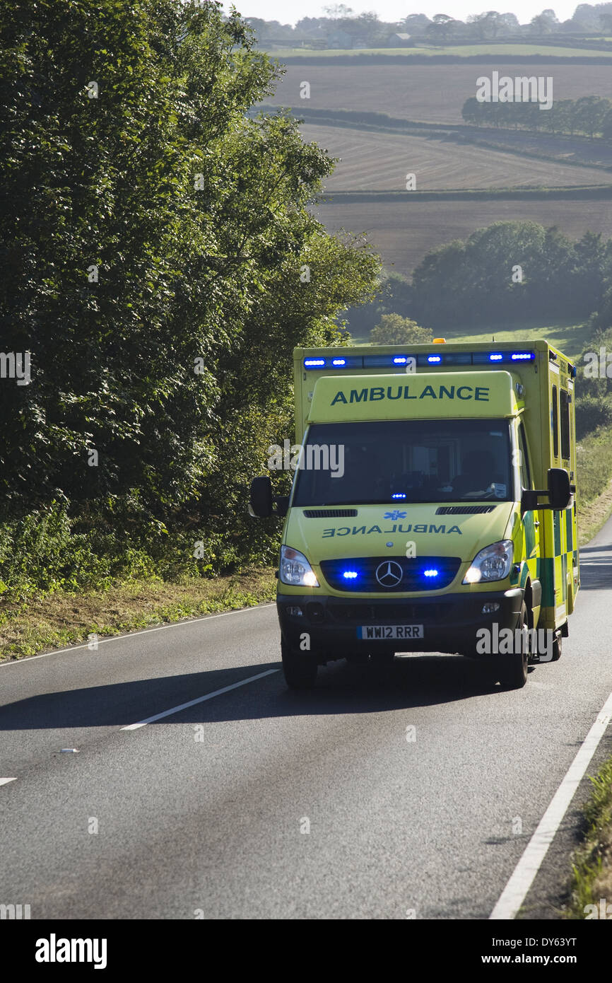 Emergency Ambulance with flashing blue lights Stock Photo Alamy