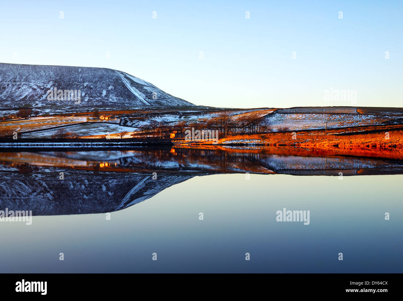 pendle hill reflected in black moss reservoir Stock Photo