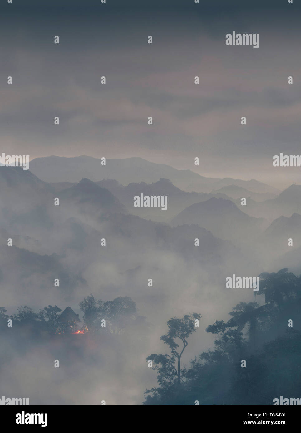 Ethnic hut and fog on a mountain, Banaue, Ifugao, Philippines, Asia Stock Photo
