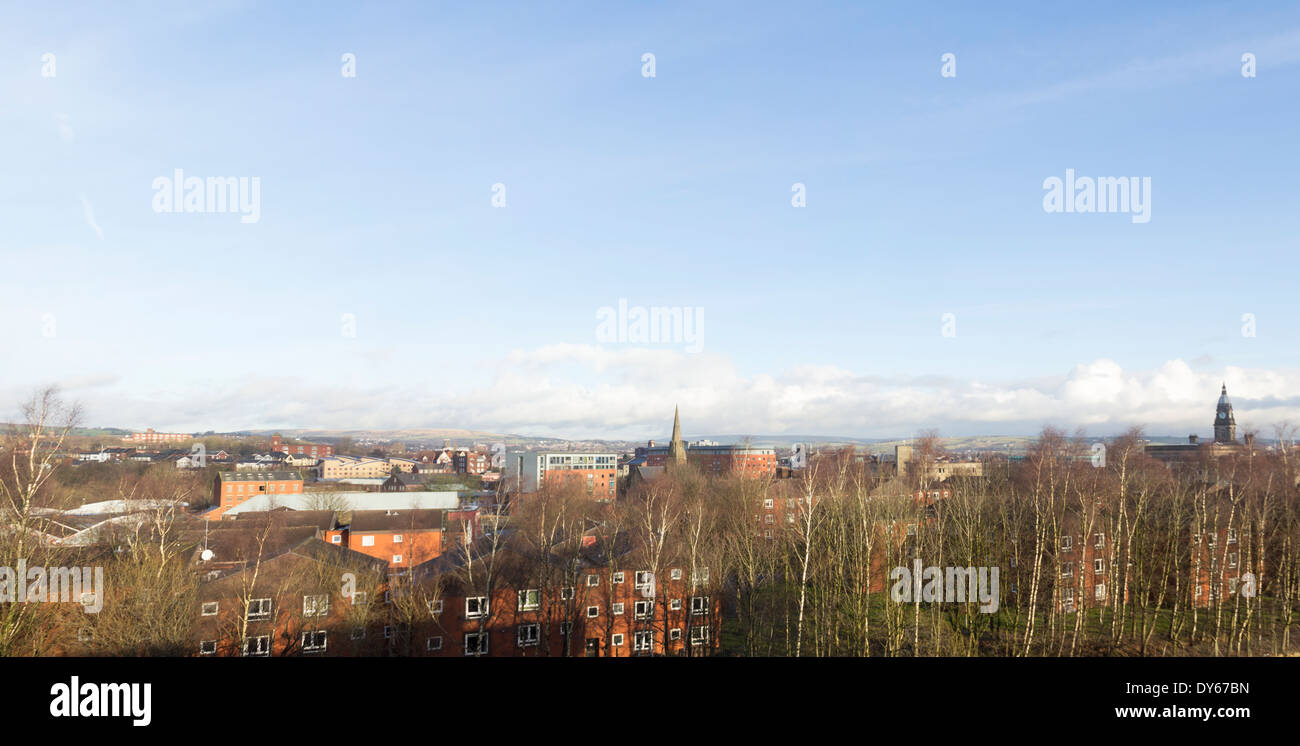Panoramic skyline of Bolton town centre looking northeast from Deane Road with the town hall