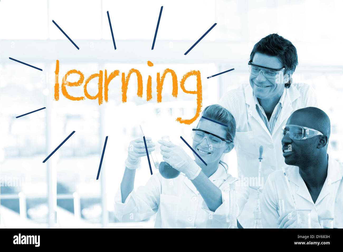 Learning against scientists working in laboratory Stock Photo