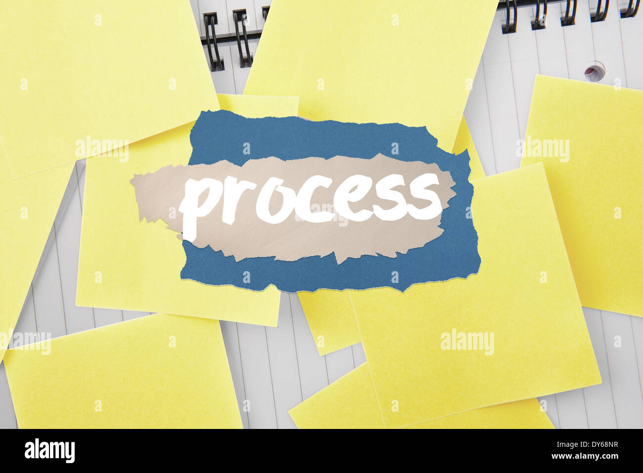 Process against sticky notes strewn over notepad Stock Photo - Alamy