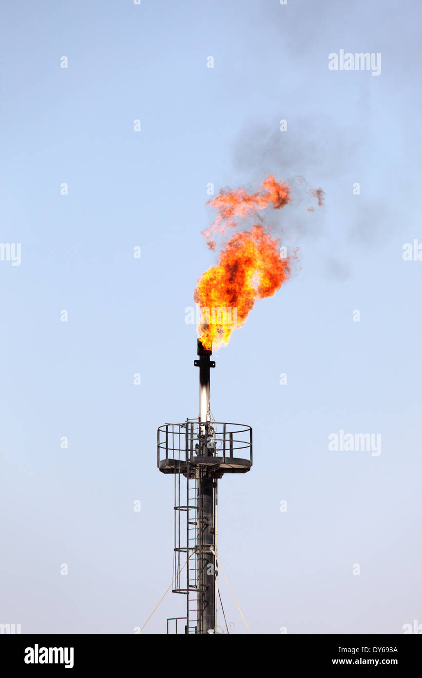 Oil torch in the desert of Bahrain, Middle East Stock Photo