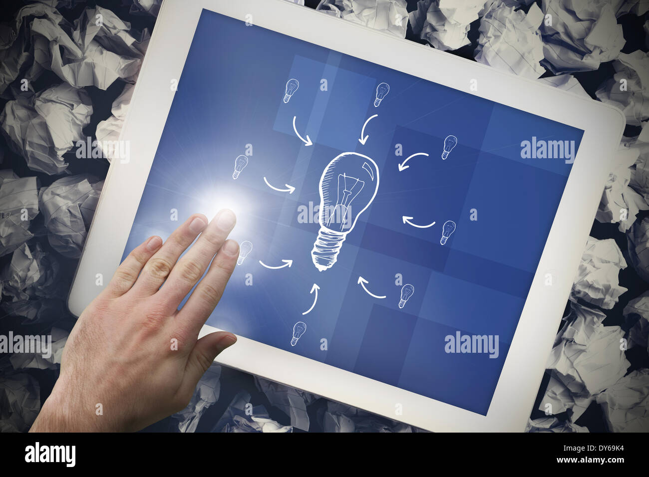 Composite image of hand touching tablet Stock Photo