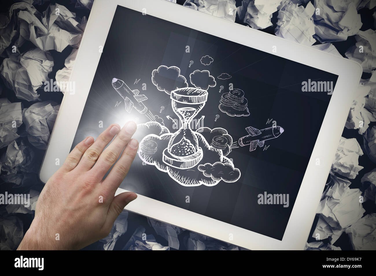 Composite image of hand touching tablet Stock Photo