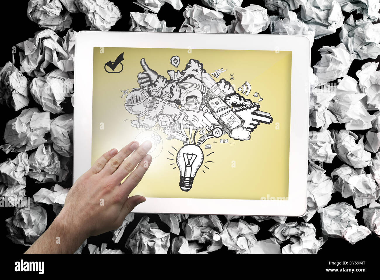 Composite image of hand touching tablet Stock Photo