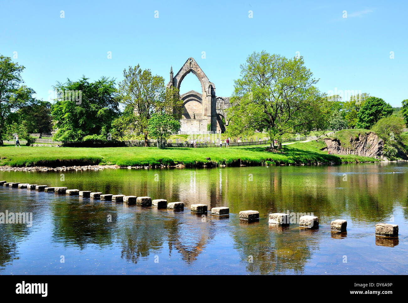bolton priory and stepping stone on river wharfe Stock Photo