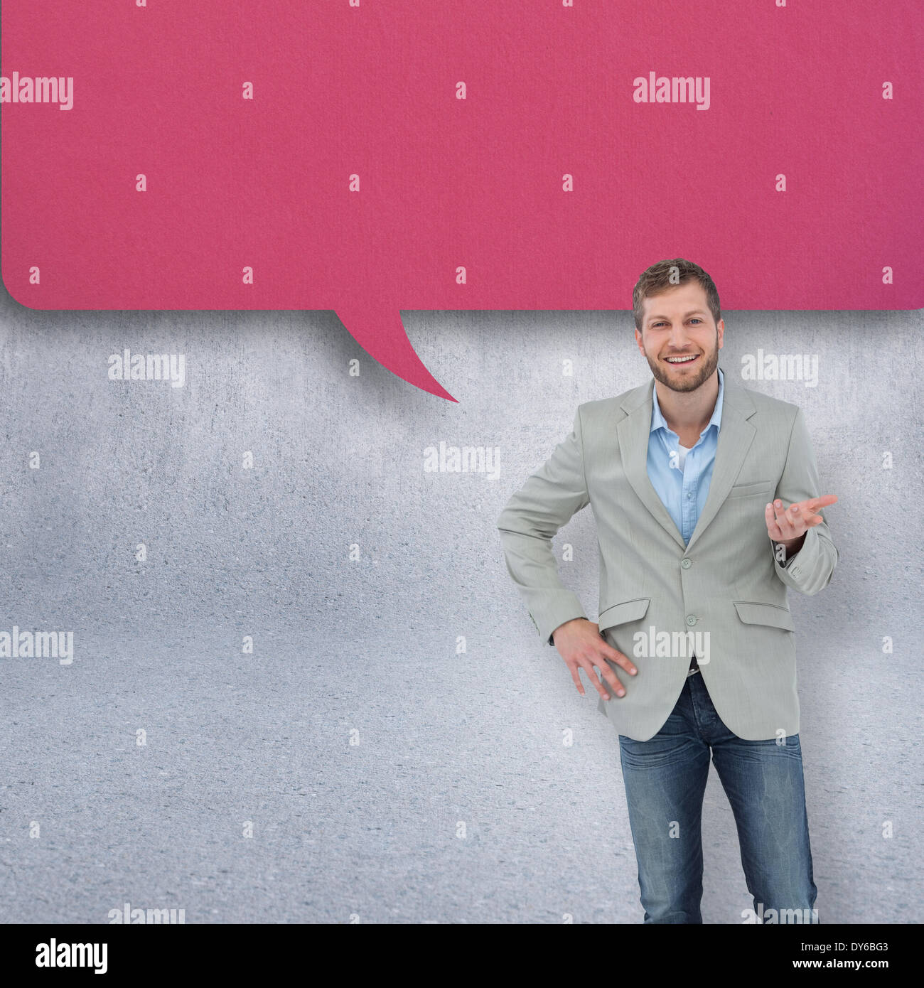 Composite image of stylish man smiling and gesturing Stock Photo