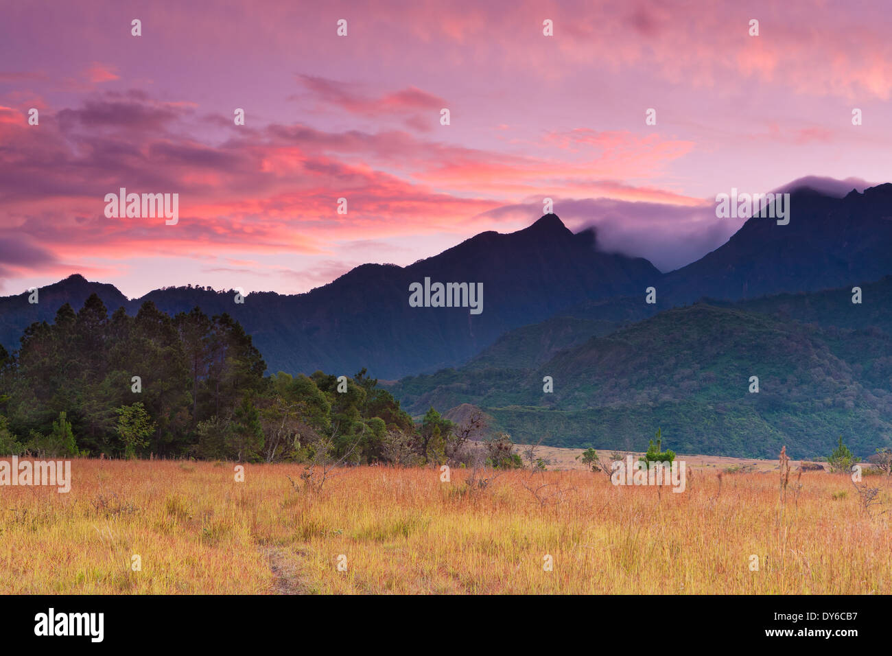 Colourful skies at dawn over Volcan Baru (extreme right), 3475 m, in the Chiriqui province, Republic of Panama. Stock Photo