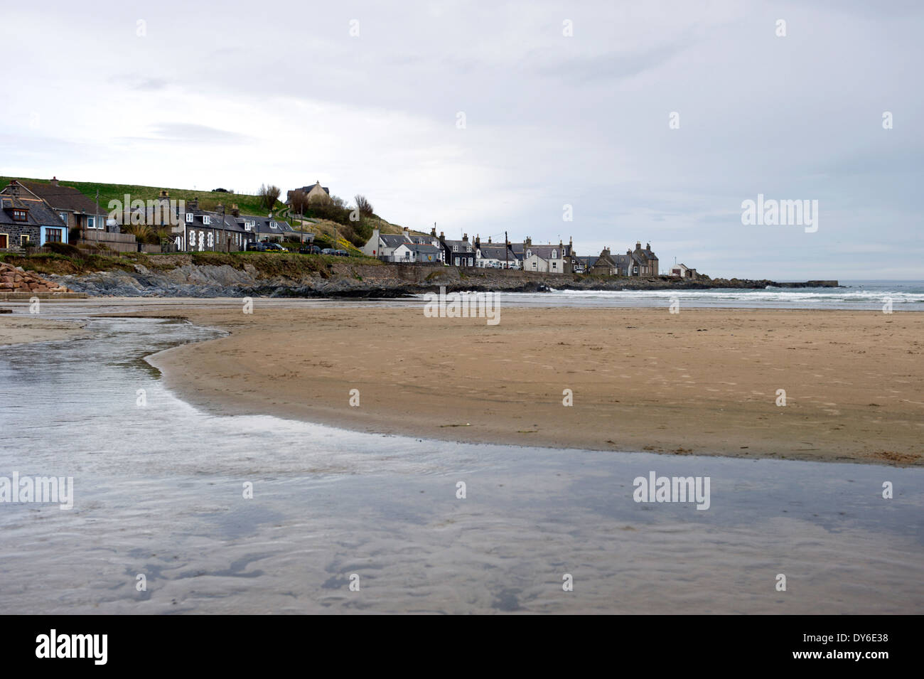 View across the beach to the village of Sandend on the Moray coast in