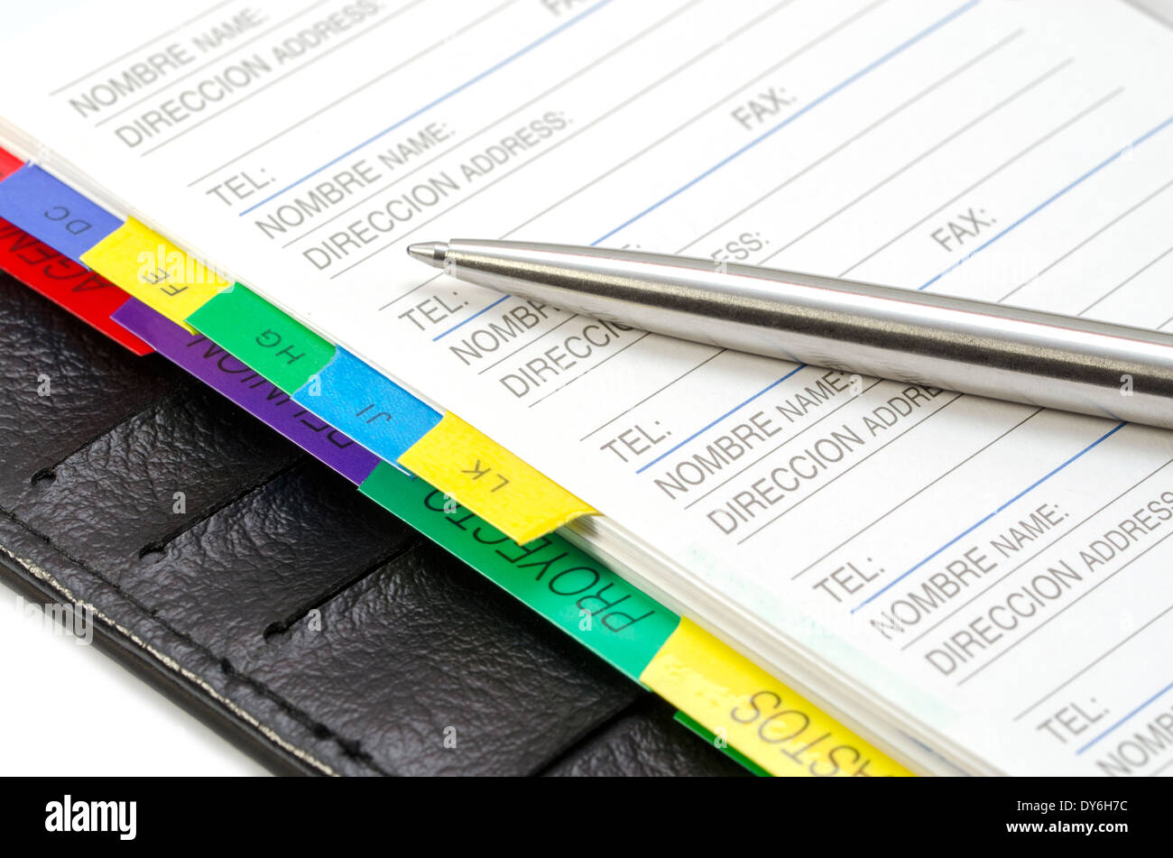 Macro shot of a pen on an open book addresses Stock Photo Alamy
