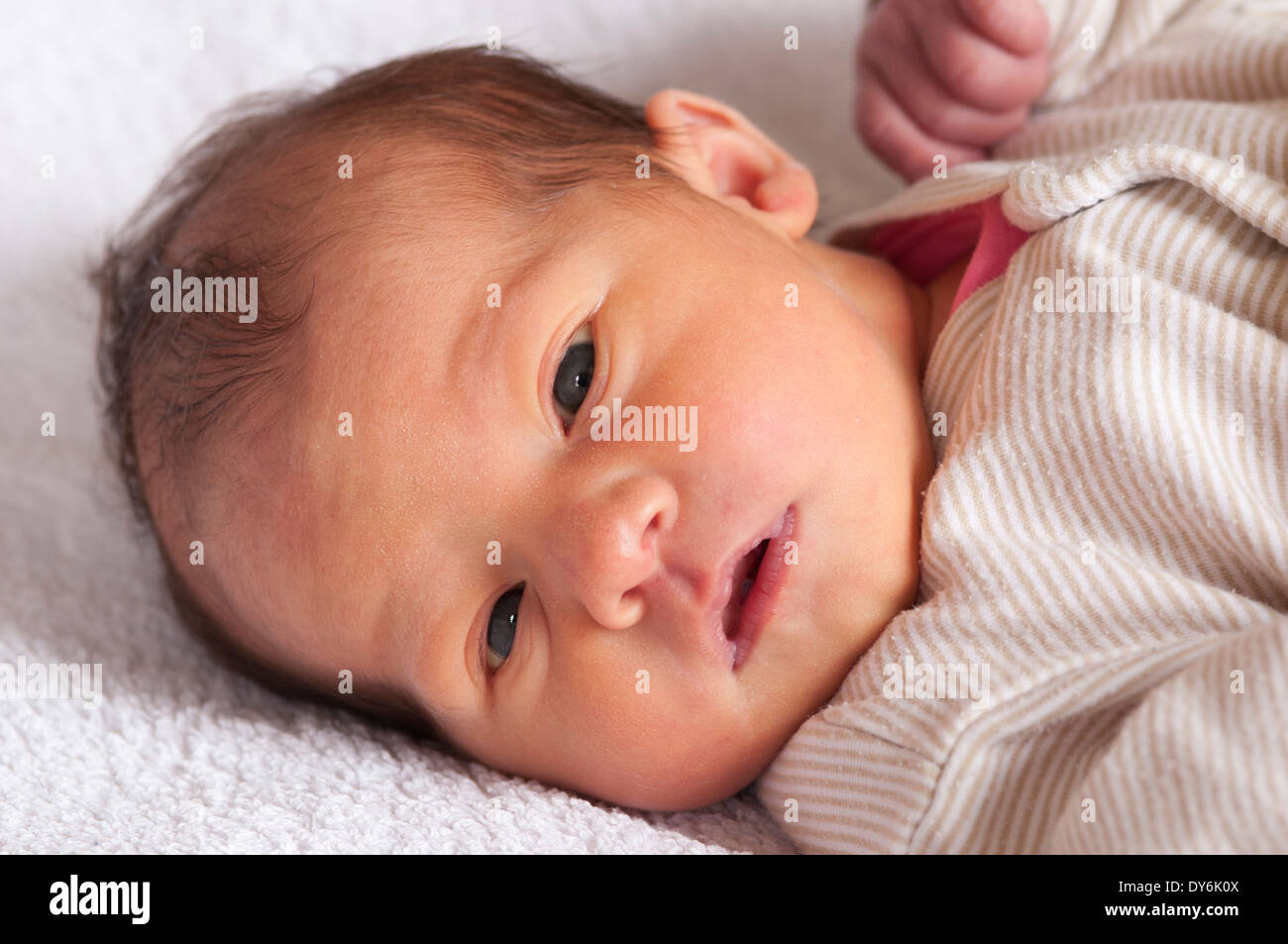 Close-up portrait of a newborn baby girl Stock Photo