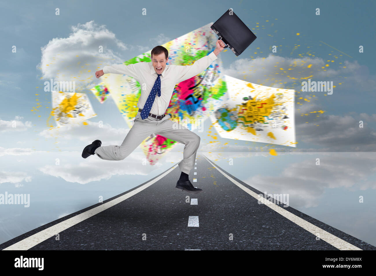 Composite image of cheerful jumping businessman with his suitcase Stock Photo