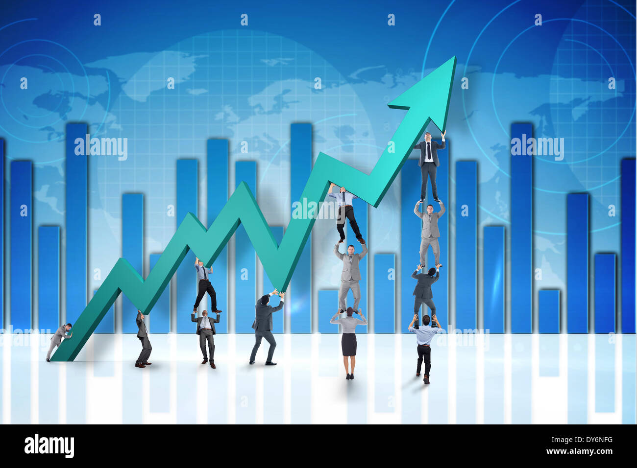 Composite image of business team holding up arrow Stock Photo - Alamy