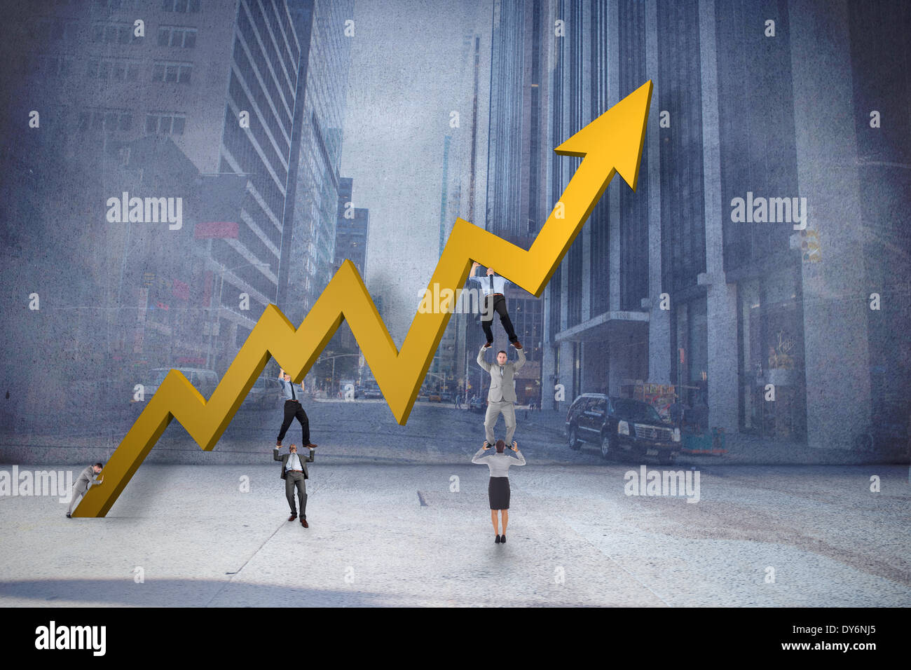 Composite image of business team holding up arrow Stock Photo - Alamy