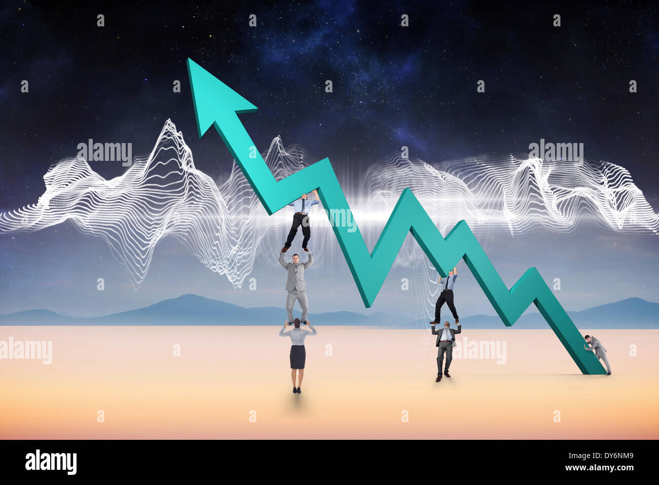 Composite image of business team holding up arrow Stock Photo - Alamy