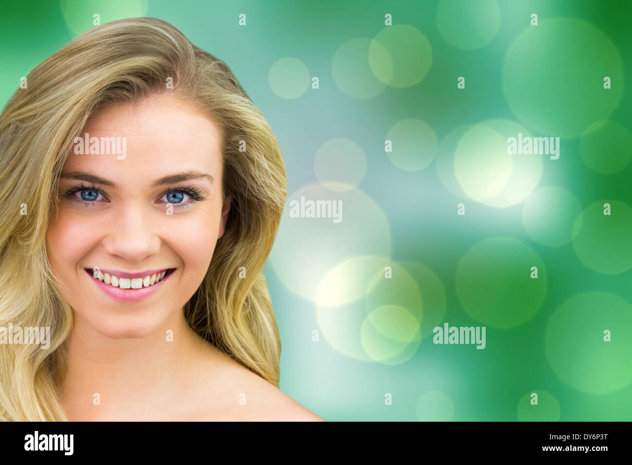 Composite image of smiling blonde natural beauty Stock Photo