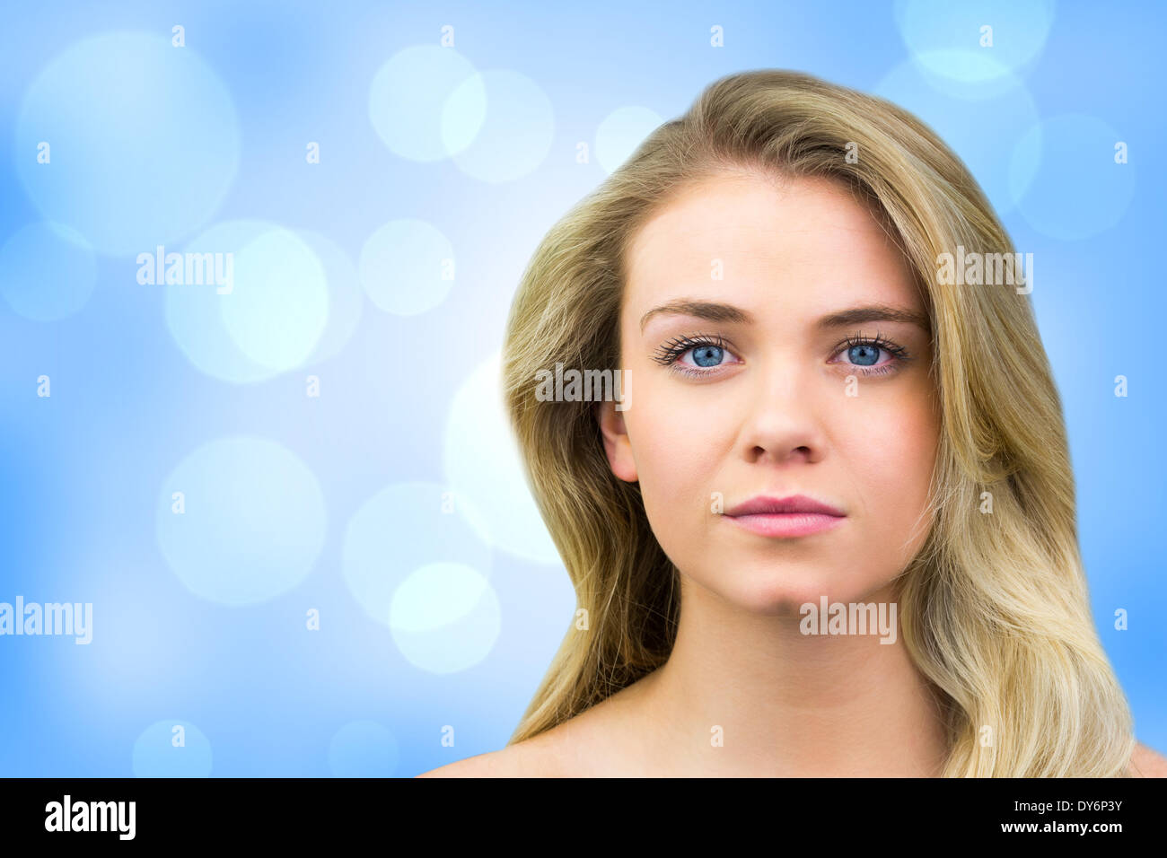 Composite image of serious blonde natural beauty Stock Photo