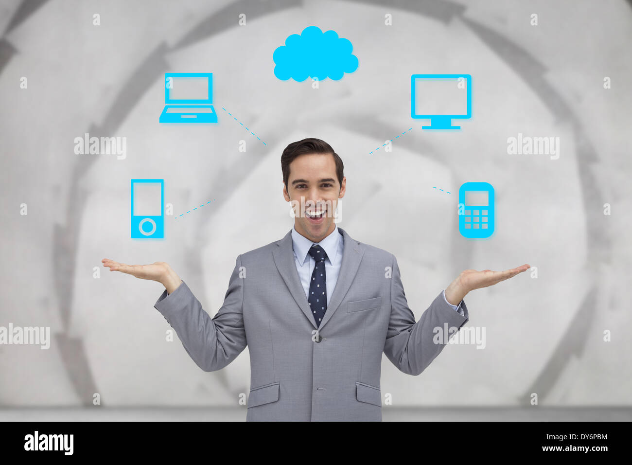 Composite image of smiling businessman presenting graphics with his hands Stock Photo