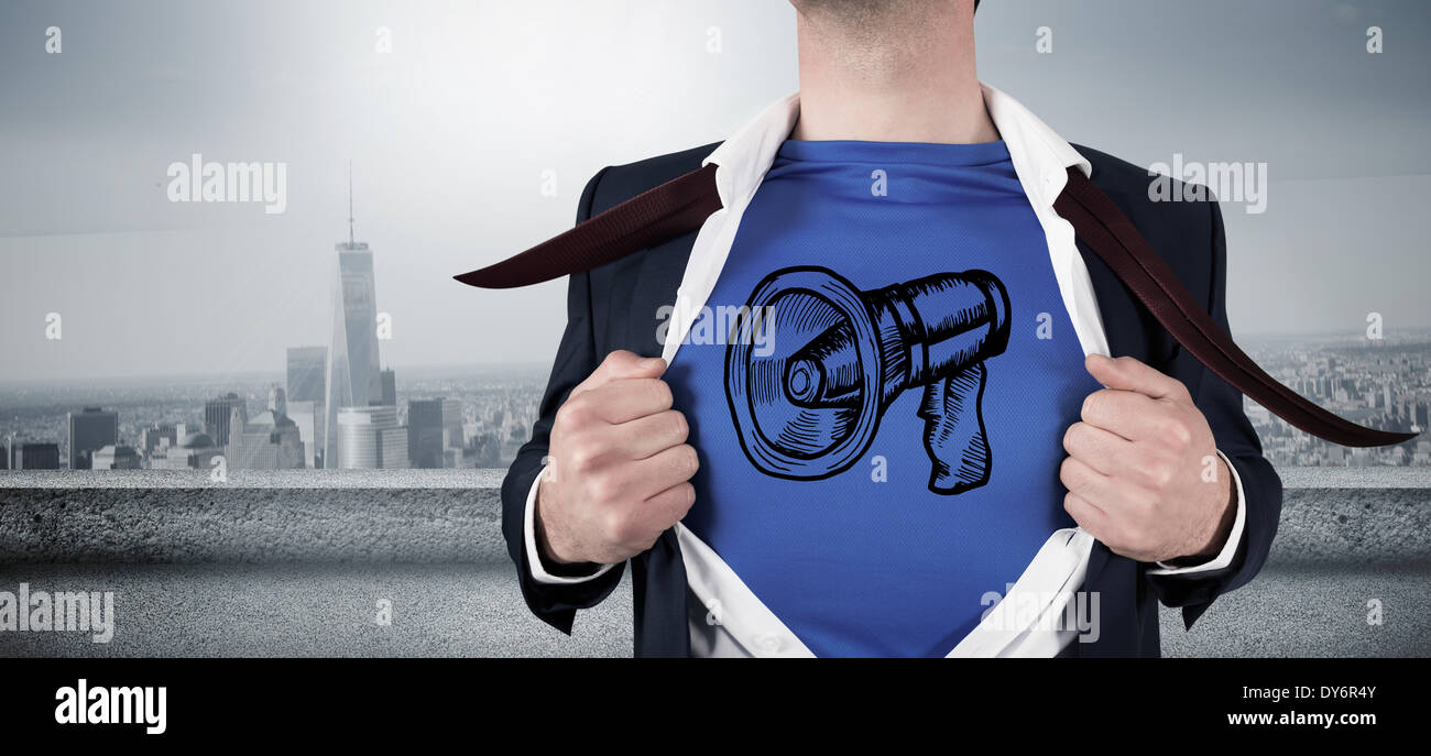 Composite image of businessman opening his shirt superhero style Stock Photo