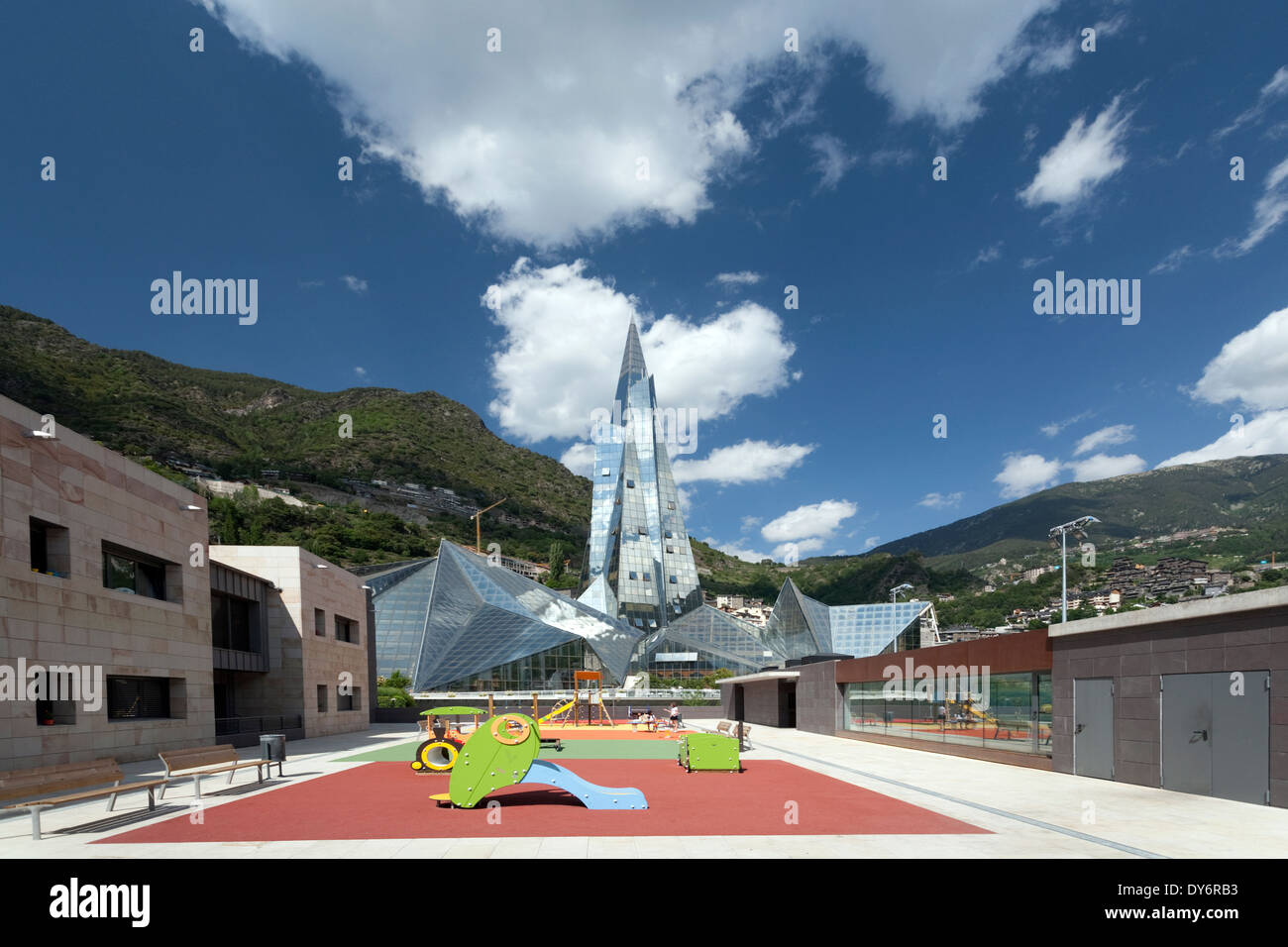 The glass covered spa Caldea in the country of Andorra la Vella as seen from a children's playground Stock Photo