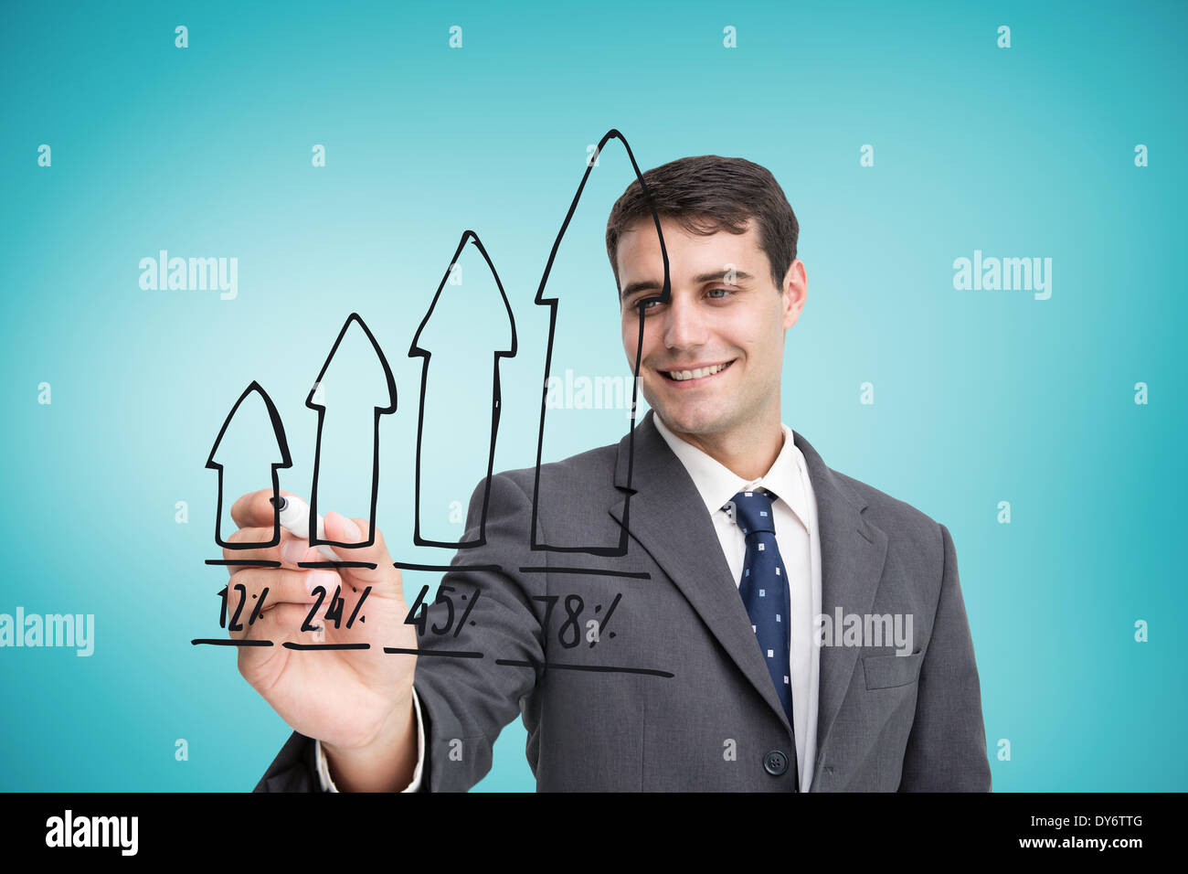 Composite image of businessman drawing graph Stock Photo