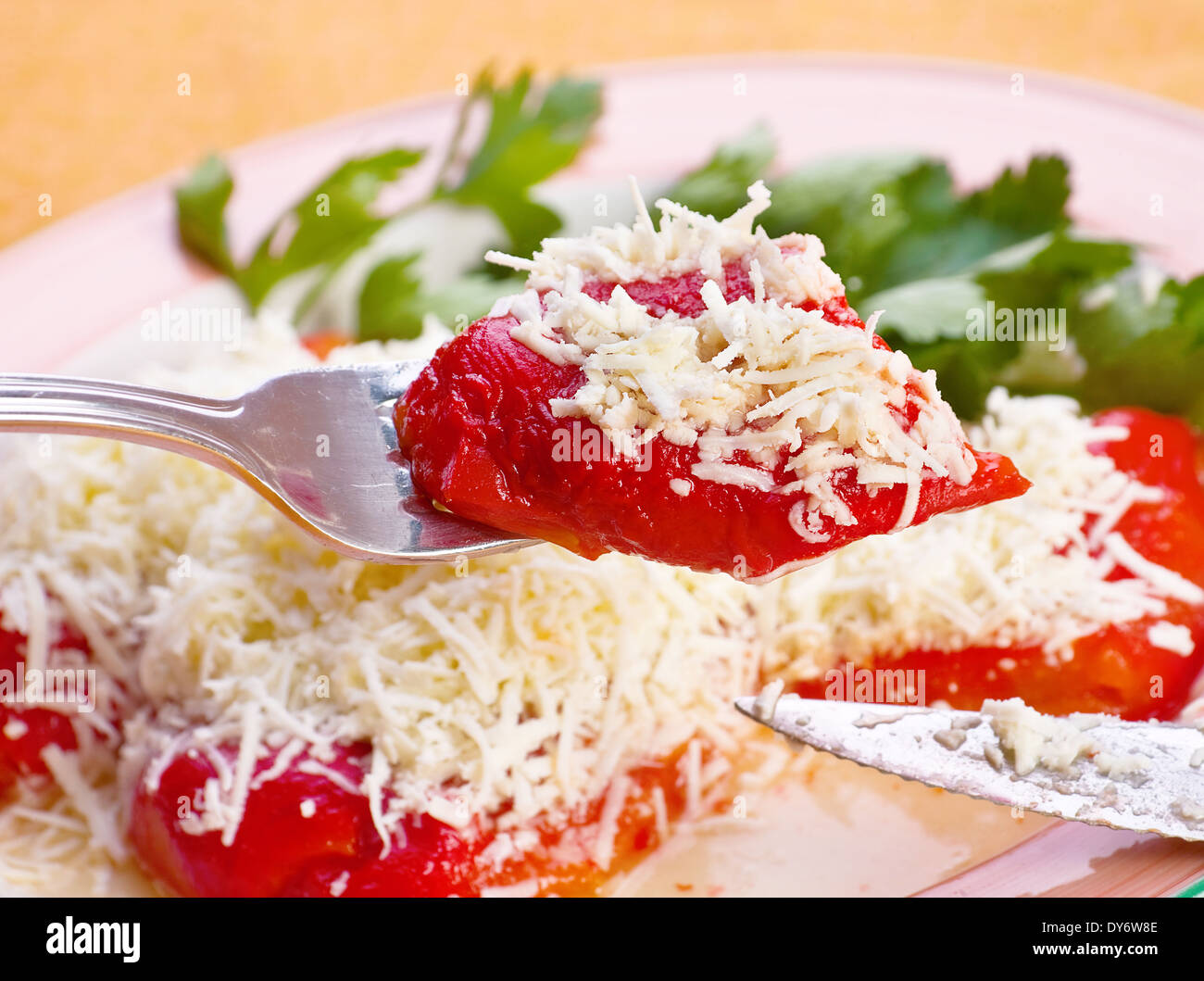 Baked red pepper vegetable with white cheese Stock Photo