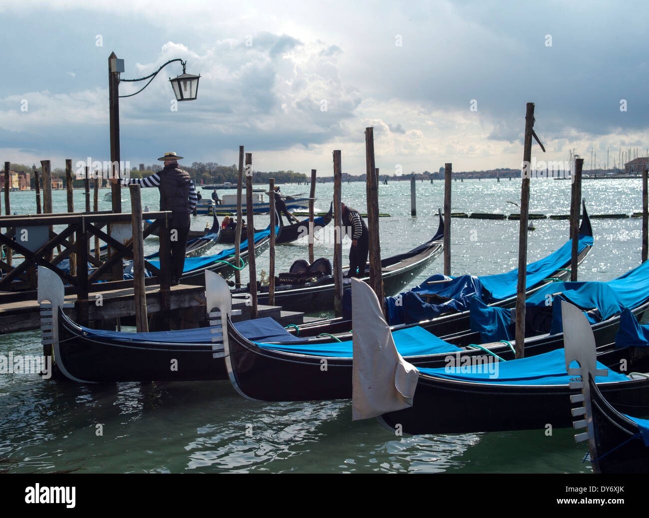 Gondolas moored at Riva degli Schiavoni by St Mark's Square, Venice, Italy Stock Photo