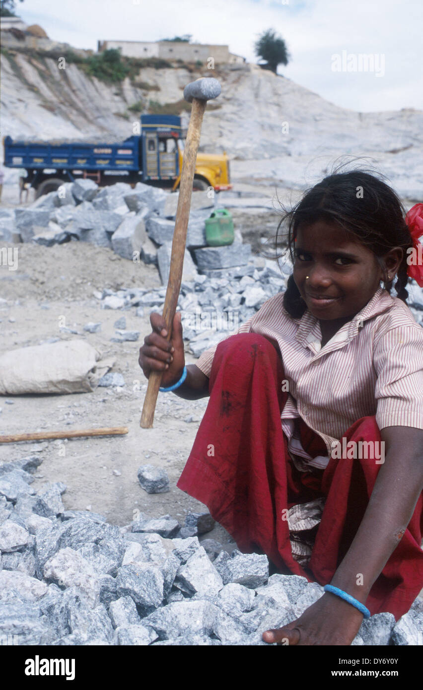 India, Karnataka, children work in granite stone quarry near Bangalore